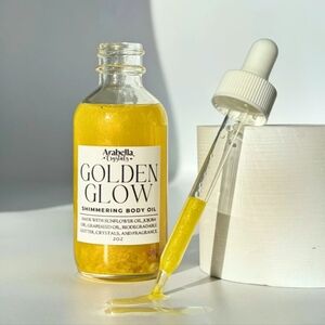 Golden Glow Shimmering Body Oil - Yellow.  NWT